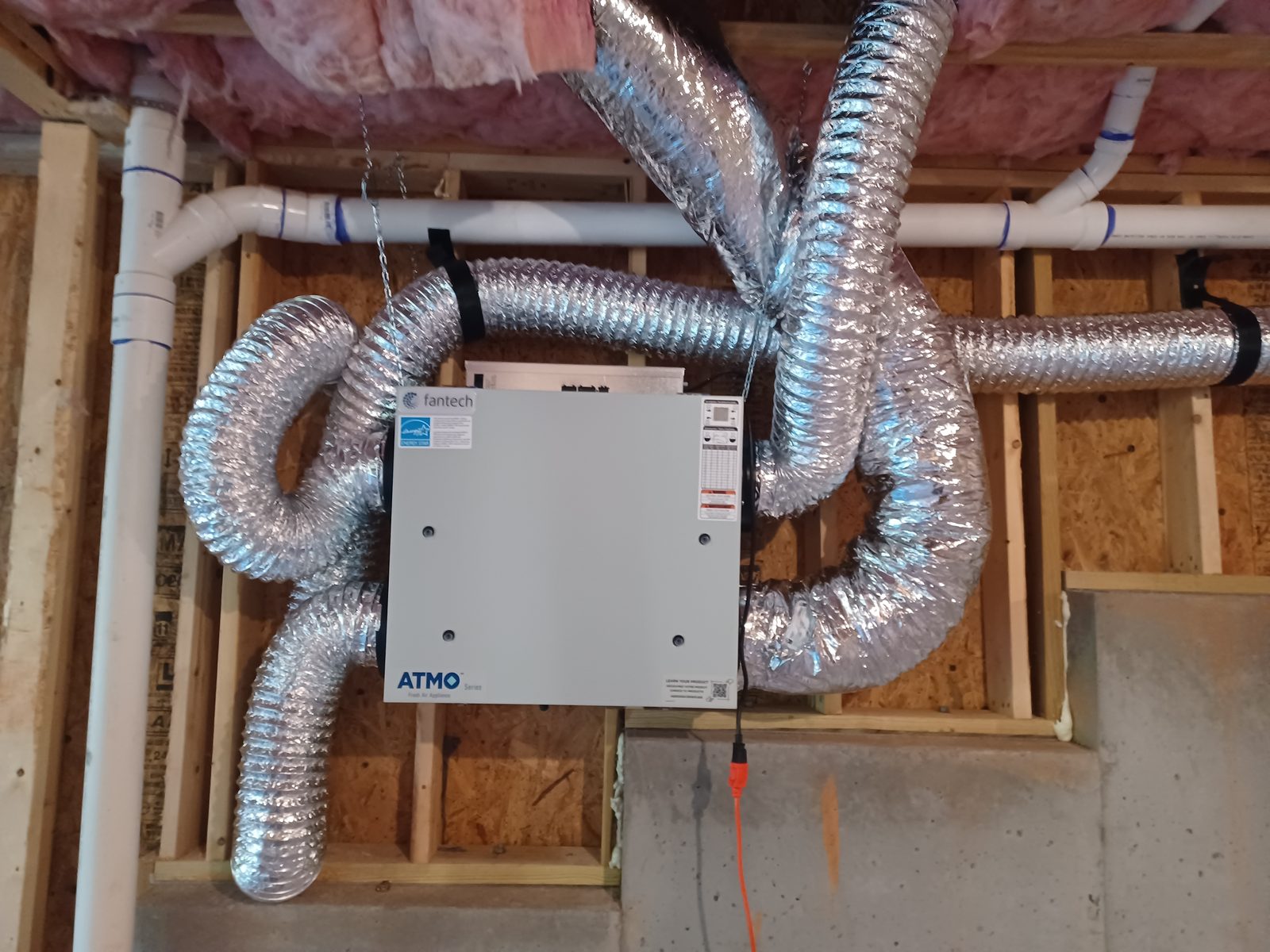 Energy recovery ventilator installed with insulated ducting